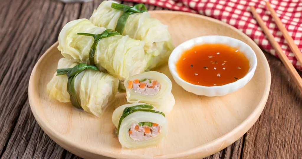 A beautifully plated dish of cabbage and ground beef with vibrant vegetables and garnishes, highlighting a simple and delicious recipe.