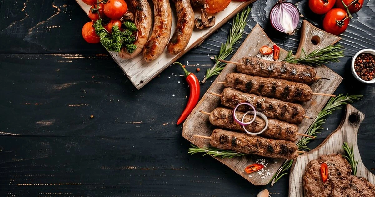 A beautifully plated dish featuring tender beef slices with colorful vegetables, served on a white plate, showcasing an easy and delicious beef recipe idea for a hearty meal.